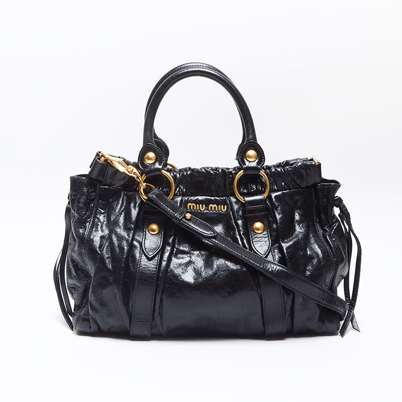 バッグ vintage 99aw miumiu leather shoulder bag Vintage Miu Miu Orange Buckled Patterned Canvas Leather