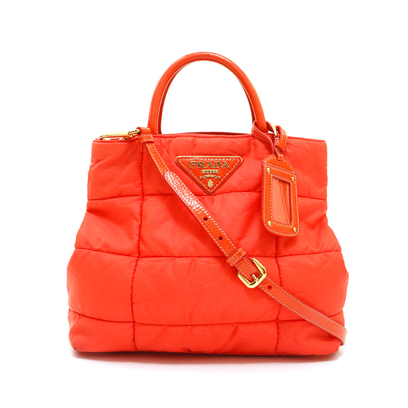 Prada orange clutch online