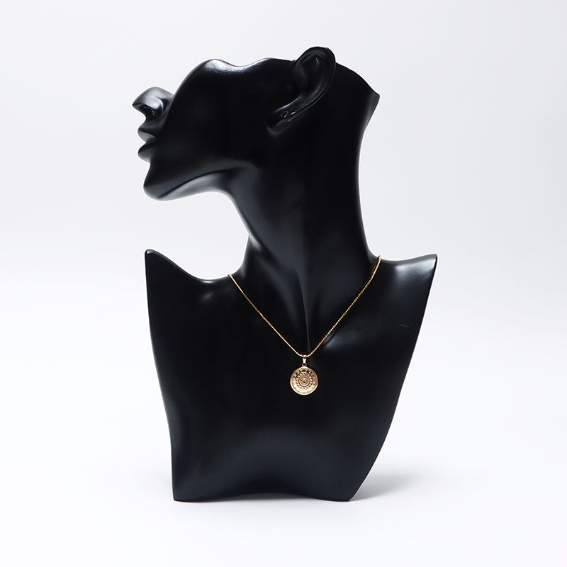 イヴ・サンローラン YVES SAINT LAURENT ロゴ ラウンド コインモチーフ