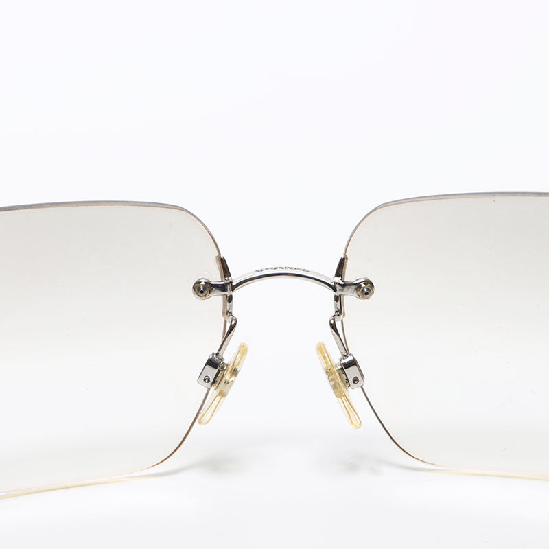 Chanel Coco Mark Clear Rhinestone Rimless Sunglasses Silver