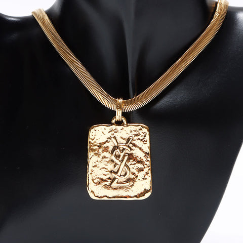 YVES SAINT LAURENT YSL logo plate Necklace gold WS12654