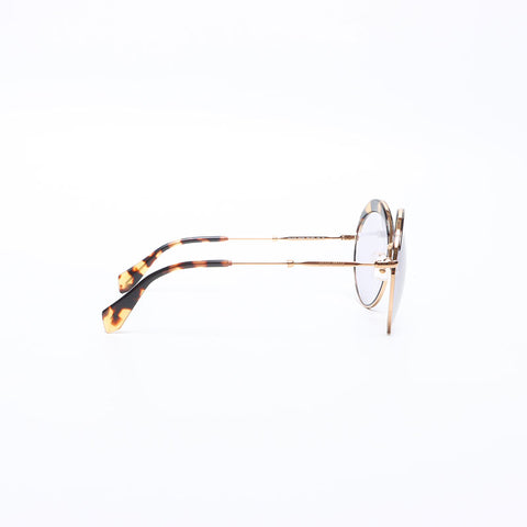 Miu Miu Lunettes de soleil rondes à monture ovale Marron WS14186