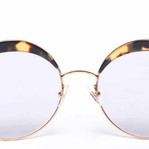 Miu Miu Lunettes de soleil rondes à monture ovale Marron WS14186