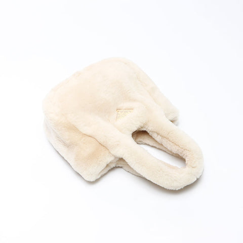 PRADA Mini sac à main en fourrure de mouton beige WS14304