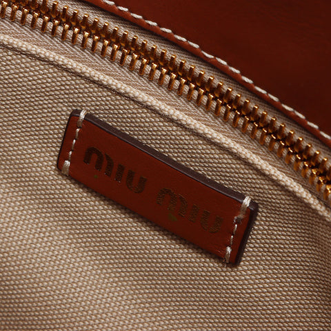 Miu Miu Basket sac 2way Sac à bandoulière beige WS14642
