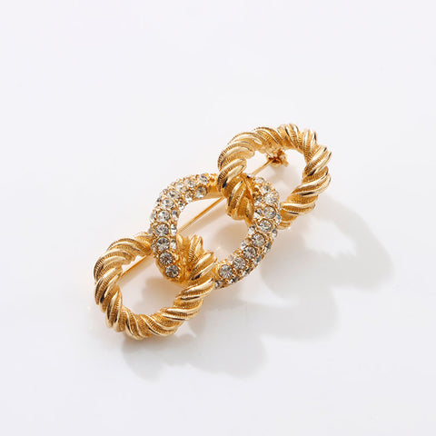 クリスチャンディオール Christian Dior ラインストーン 結び目モチーフ ブローチ ゴールド WS14691