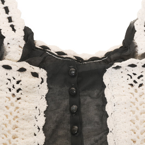 CHANEL Sleeveless knit with lace and COCO Mark buttons Tank top white WS16104