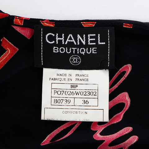 Chanel Taille sans manches de motif en soie: 36 chemise à manches courtes noire WS1644