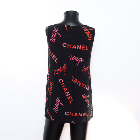 Chanel Taille sans manches de motif en soie: 36 chemise à manches courtes noire WS1644