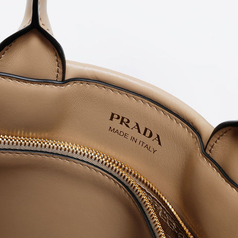 PRADA Symbol Topstitch Handbag beige WS20218
