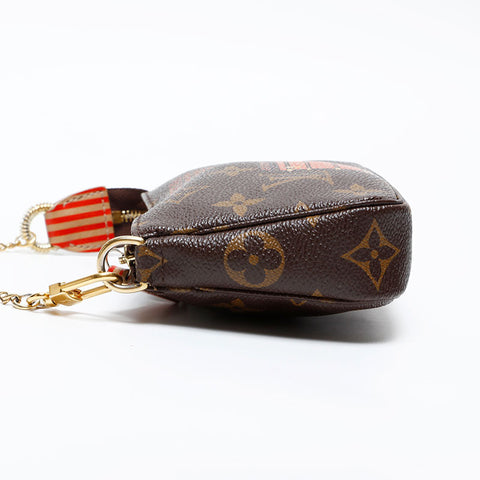LOUIS VUITTON 2013 Monogram Mini Pochette Accessoires Trunk Print