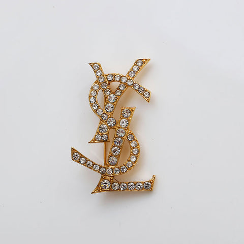 イヴ・サンローラン YVES SAINT LAURENT ラインストーン ロゴ ブローチ ゴールド WS22092