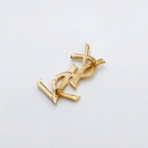 イヴ・サンローラン YVES SAINT LAURENT ラインストーン ロゴ ブローチ ゴールド WS22092