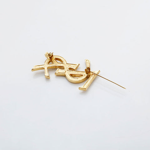 イヴ・サンローラン YVES SAINT LAURENT ラインストーン ロゴ ブローチ ゴールド WS22092