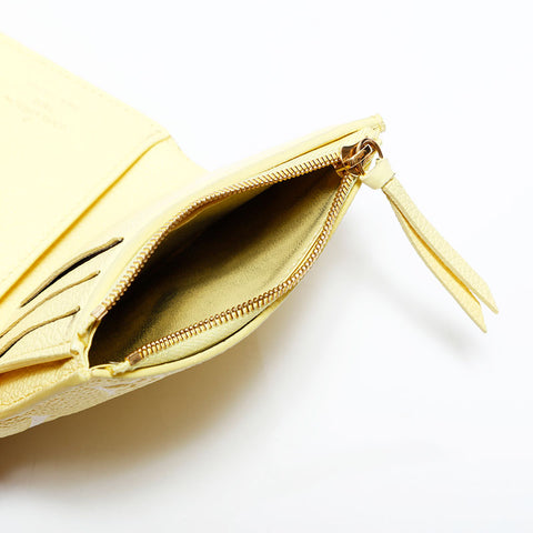 LOUIS VUITTON Monogram Empreinte Portefeuille Victorine Tri-fold wallet yellow WS22312