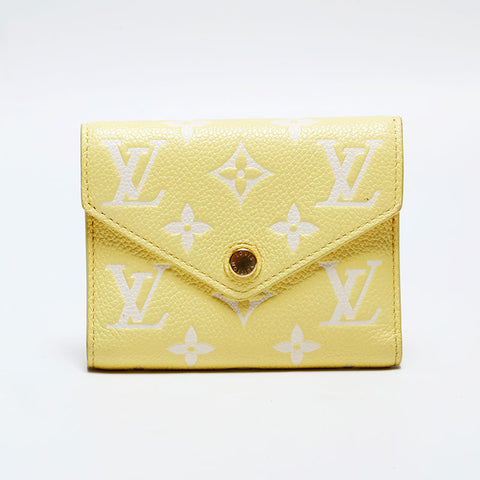 LOUIS VUITTON Monogram Empreinte Portefeuille Victorine Tri-fold wallet yellow WS22312