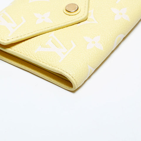 LOUIS VUITTON Monogram Empreinte Portefeuille Victorine Tri-fold wallet yellow WS22312