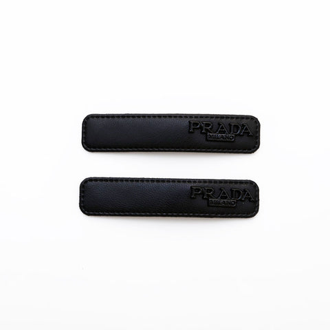 PRADA Set of 2 logo hair clips hair accessory black WS22367