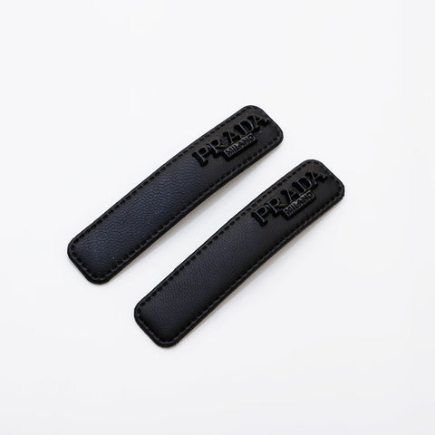 PRADA Set of 2 logo hair clips hair accessory black WS22367