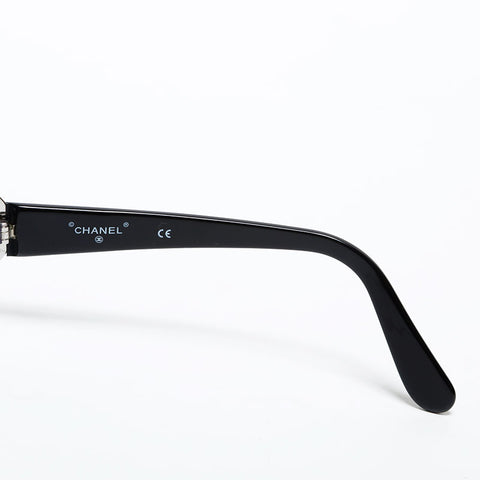 CHANEL Metal frame sunglasses black WS22386