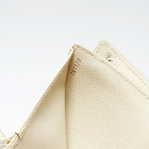 LOUIS VUITTON 2010 Portefeuille Joy Tri-fold wallet white WS24233