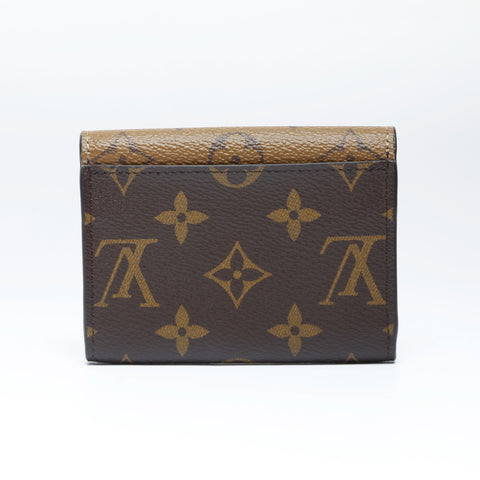 LOUIS VUITTON Monogram Reverse Porte Monnaie Rosary Bifold Wallet Brown WS24238