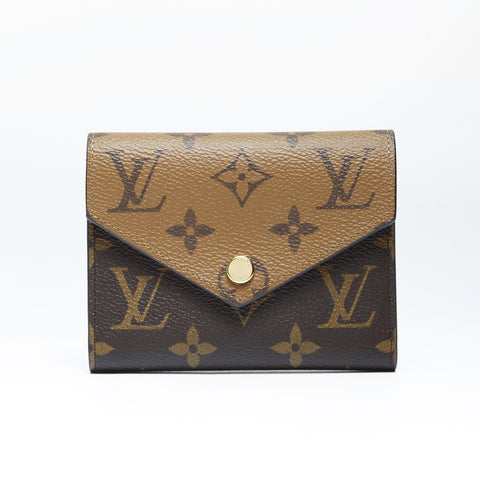 LOUIS VUITTON Monogram Reverse Portefeuille Victorine Tri-fold wallet PVC Brown WS24250