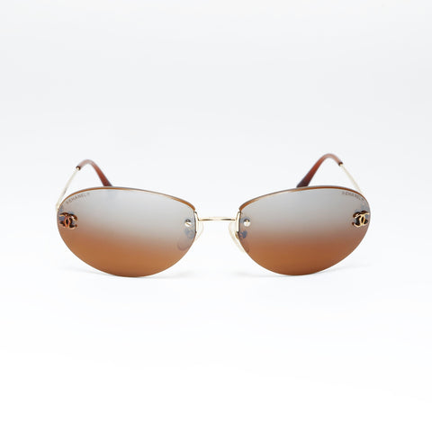 CHANEL Rimless sunglasses Brown WS24290