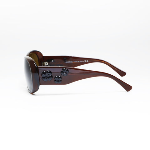 CHANEL Camelia sunglasses Brown WS24292