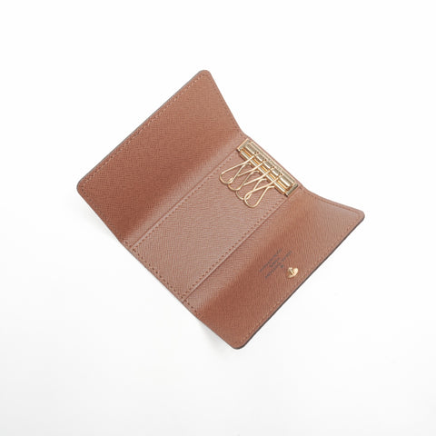 LOUIS VUITTON 2009 Monogram Multicles4 Key holder  Brown WS24372
