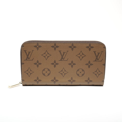 LOUIS VUITTON Zippy Wallet Monogram Reverse Geldbörse Braun WS24418