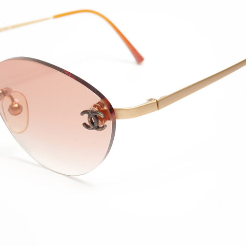CHANEL Rimless sunglasses Brown WS24545
