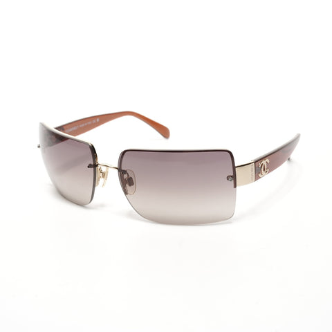 CHANEL Rimless sunglasses Brown WS24924