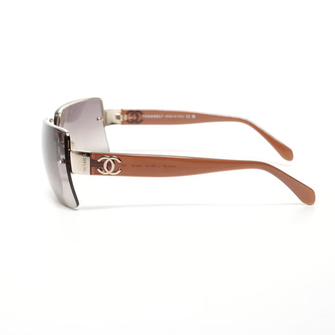 CHANEL Rimless sunglasses Brown WS24924