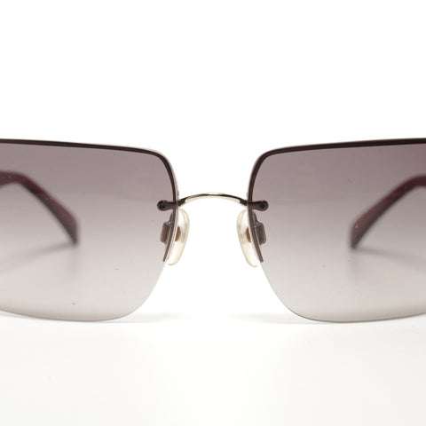 CHANEL Rimless sunglasses Brown WS24924