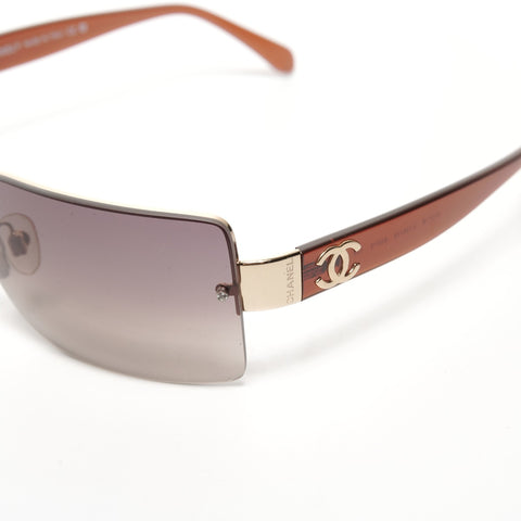 CHANEL Rimless sunglasses Brown WS24924
