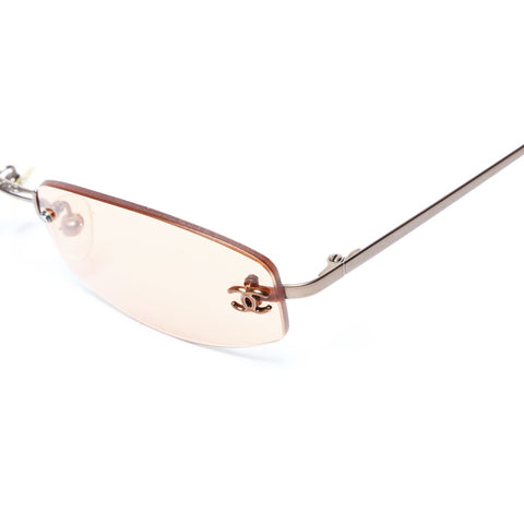 CHANEL Rimless sunglasses Orange WS25007