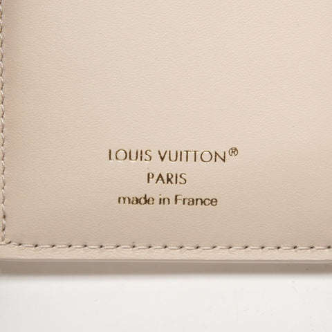 LOUIS VUITTON Taurillon Clemence Portefeuille Capucines Compact Tri-fold wallet Ivory WS27305