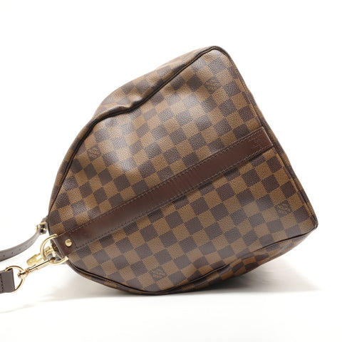 LOUIS VUITTON Damier Keepall Bandoulire, made in 2007. Boston bag Brown WS27570