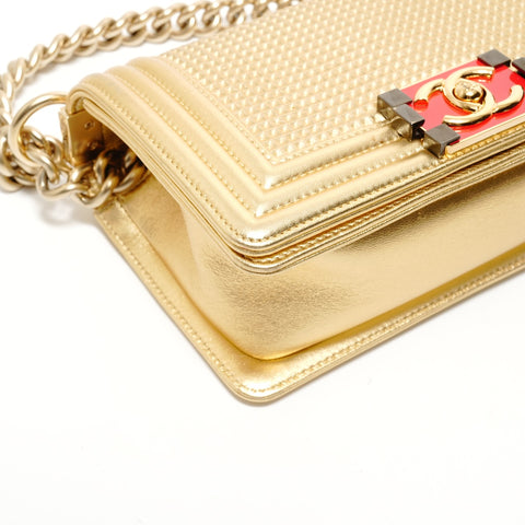 CHANEL Article n ° 19 Boy Chanel Petit sac à bandoulière or WS28053