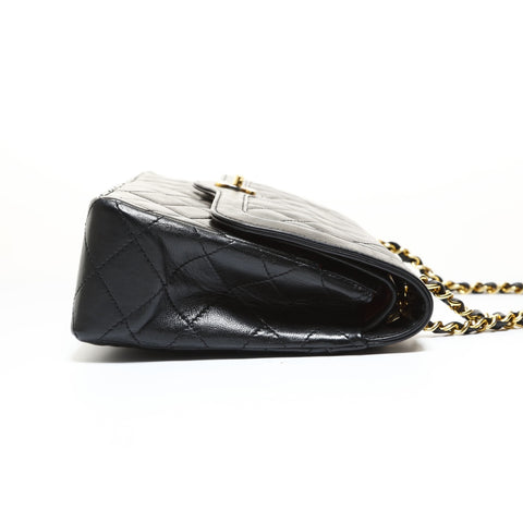 CHANEL Series 0 (1985-1986): Matelass combination with Metal double flap. Shoulder Bag black WS28627