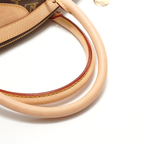 LOUIS VUITTON Monogram Tivoli PM, manufactured in 2008. Handbag Brown WS28866