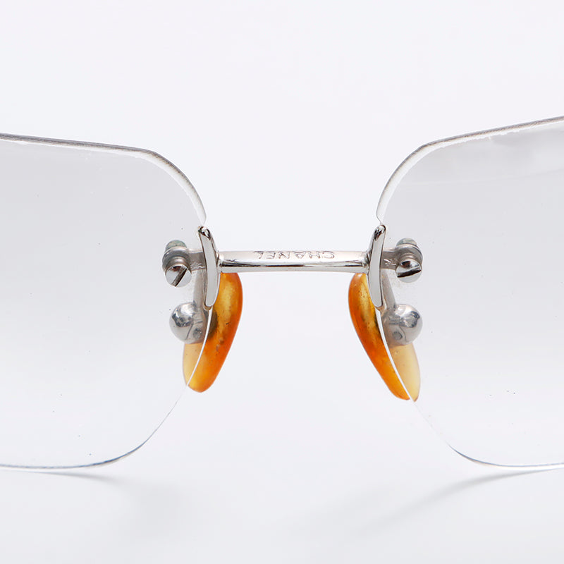 Chanel CHANEL Coco Mark Frameless Sunglasses Silver WS9033 – NUIR