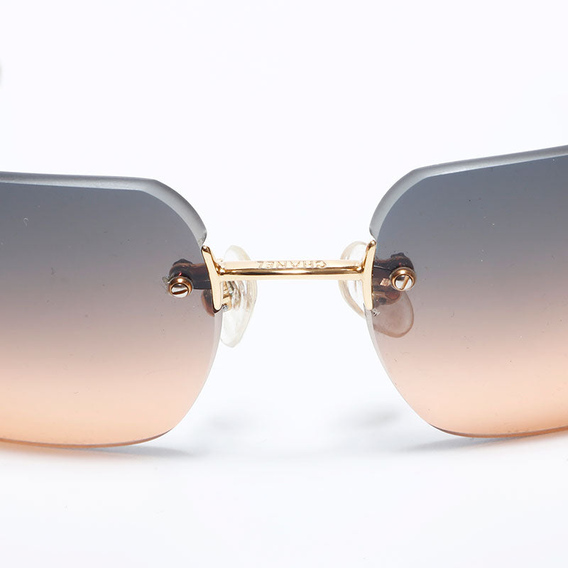 Chanel Coco Mark Rimless Gradient Frameless Sunglasses Orange