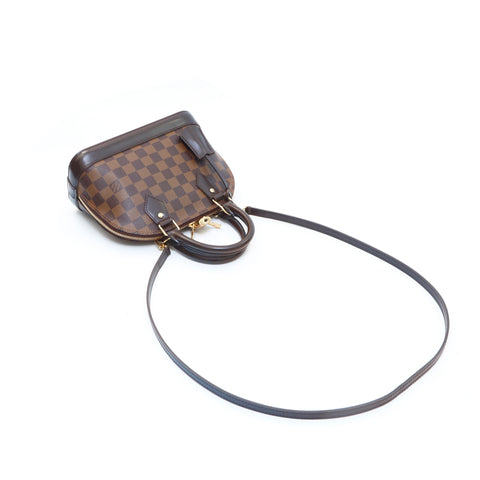 Louis Vuitton Alma Small Model Handbag in Brown Monogram Canvas