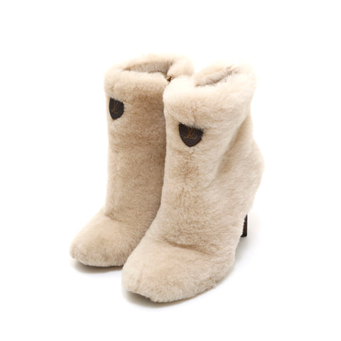 Louis Vuitton Louis Vuitton Silhouette Linie Boa Fell -Knöchelstiefel Brown x Beige P13971